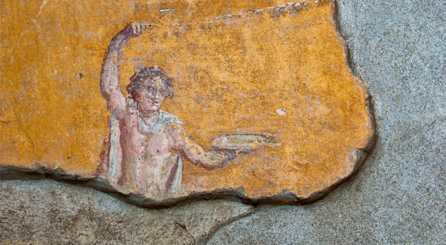 Descubren la representación más antigua de una pizza en las paredes de Pompeya 